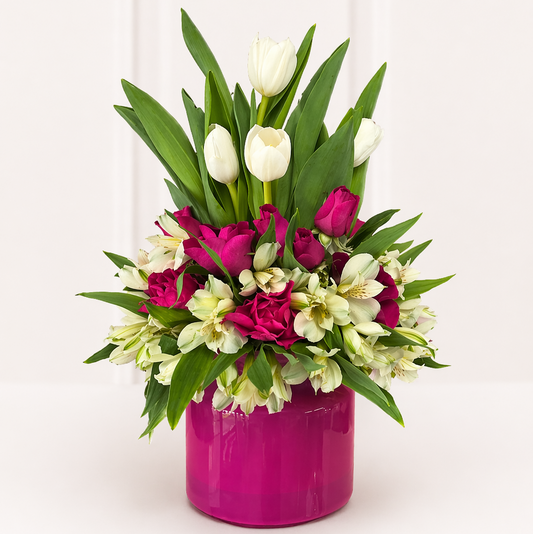Tulip and rose arrangement in modern pink vase Toronto