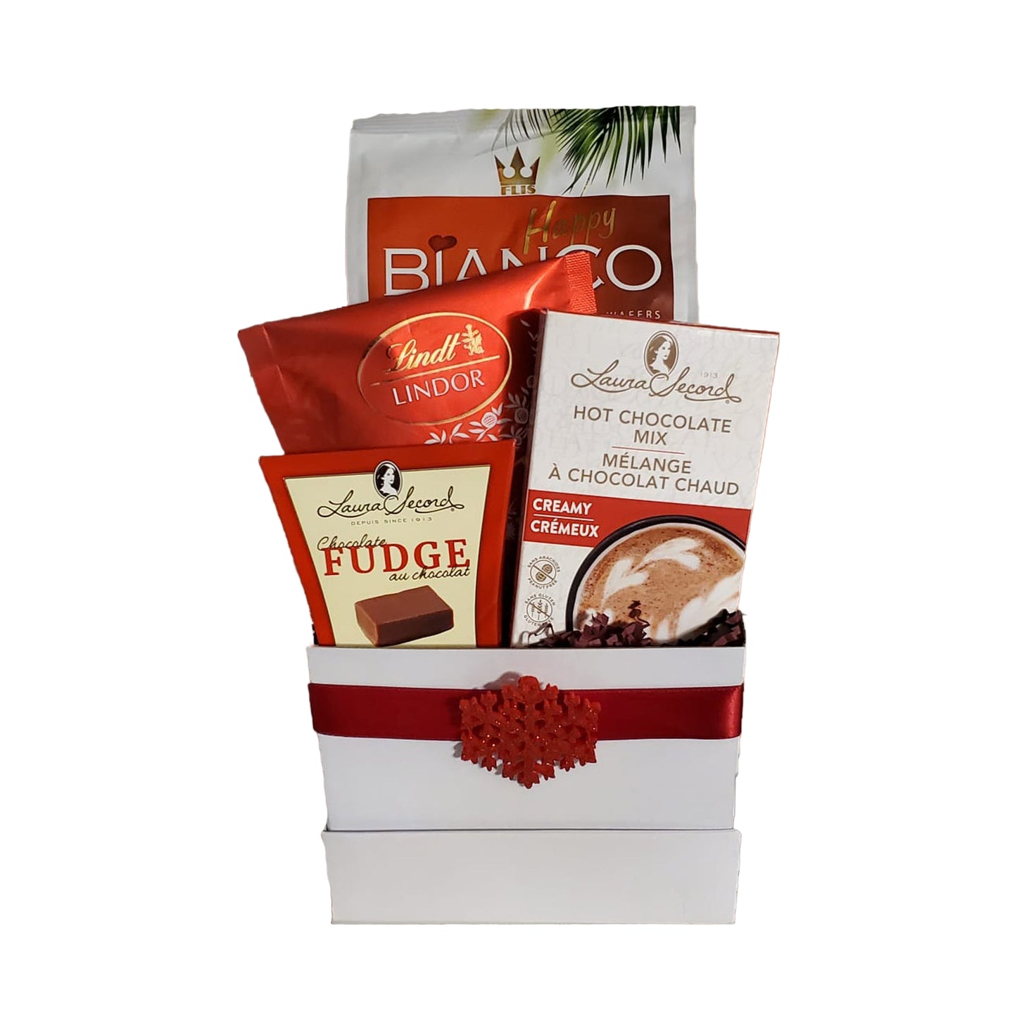 White box with red ribbon with chocolate treats